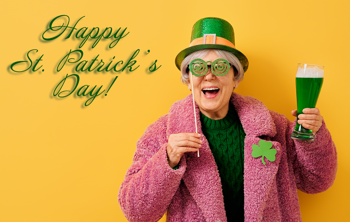 woman in leprechaun hat wishing you a happy St. Patrick's Day!